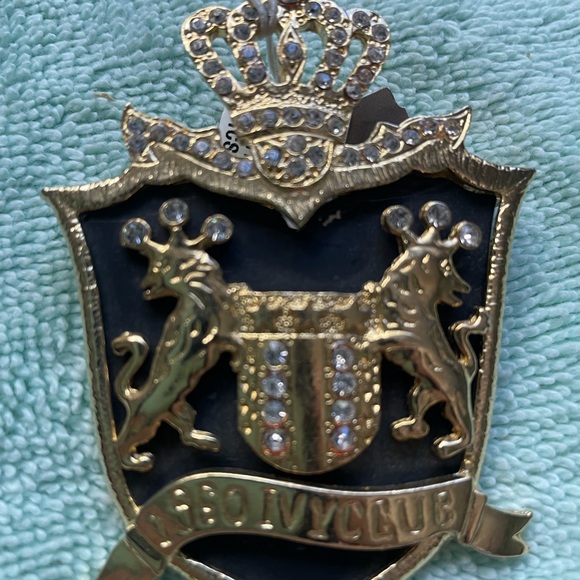 Jewelry - Royal Crest 1960IVVCLUE Gold and rhinestones with Crown on top gold tone metal.